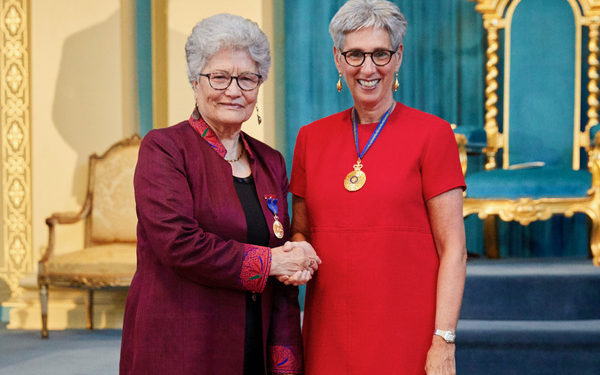 Nouria presented with her AM by the Victorian Governor